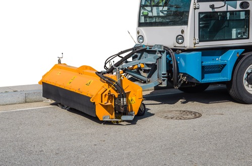 Balayeuse ramasseuse sur véhicule